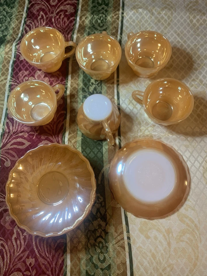 Juego de 7 tazas y platillos Fire King para horno brillo melocotón 3 bandas anclaje enganche Foto 1 de 4