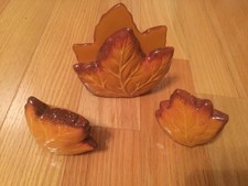 Orange Salt and pepper with a napkin holder in the shape of a maple leaf