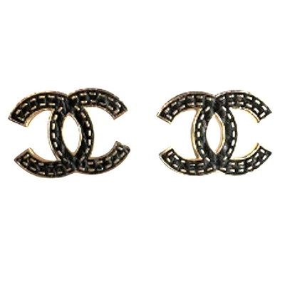 Chanel Oro y Negro Texturizado Aretes Entrelazados Otoño 2023 (CHXX020) Foto 1 de 4