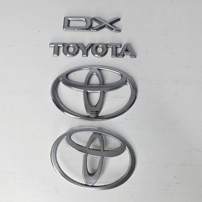 Toyota Corolla DX 1988-1989-1990-1992 emblema maletero trasero OEM Foto 1 de 4