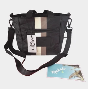 NUEVA BANDOLERA ALOHA COLLECTION LE VOYAGEUR - CAFÉ SOBRE NEGRO - Imagen 1 de 4