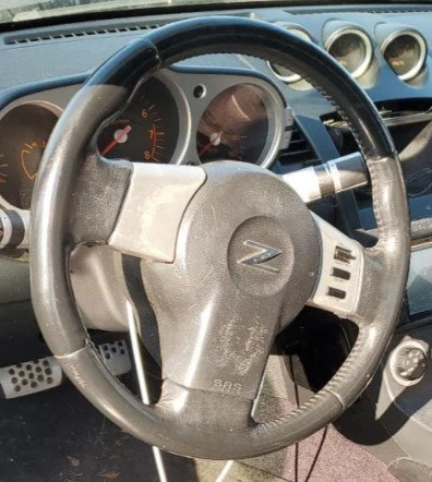 2004-2006 Nissan 350Z LH Driver Steering Wheel Airbag OEM - Изображение 1 из 3