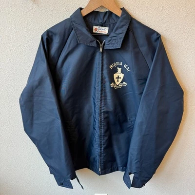 Chaqueta cortavientos de colección Sigma Chi Coaches Suncraft ropa deportiva XL-XXL azul marino con cremallera Foto 1 de 4