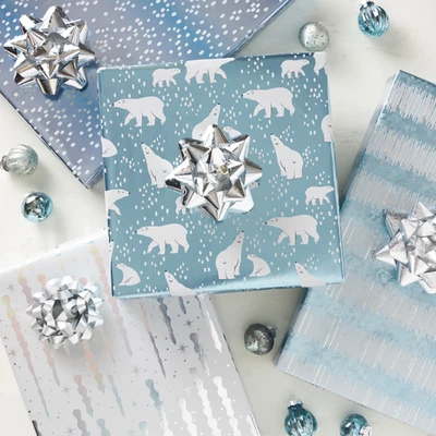 Blue & White Christmas Wrapping Paper Set - 4 Rolls, 50 Sq Ft Holographic Foil - Image 1 of 4