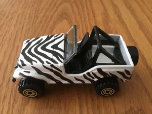 Jeep Safari 1990 vintage Hot Wheels blanco fundido a presión 1:64 Zebra Stripe negro - Imagen 1 de 4