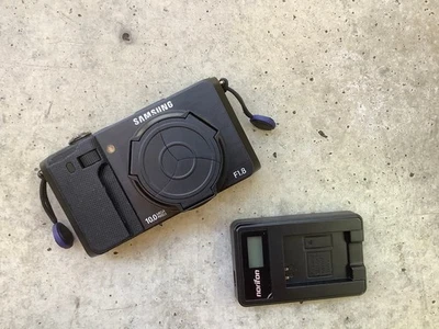 Samsung EX1 10,0 MP Digitalkamera AMOLED Display - Schwarz - RAR - Bild 1 von 4