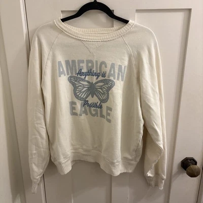Sudadera American Eagle para mujer pequeña blanca todo es posible Foto 1 de 4