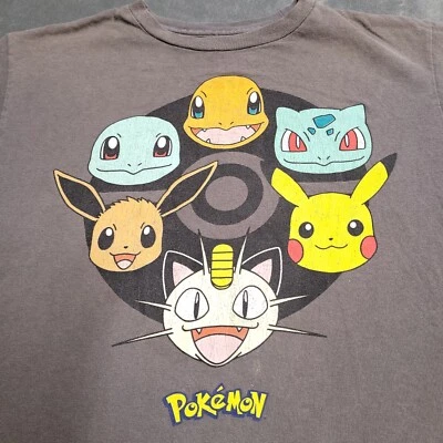 Camisa Pokemon Niños XL Logo Deletreado Pikachu Squirtle Eevee Juventud Sin Etiqueta Manchada Foto 1 de 4