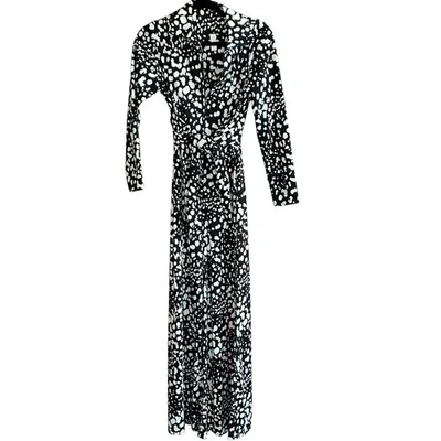 Cinturón envolvente mono Palazzo tejido a lunares jersey blanco y negro vintage años 70  Foto 1 de 4