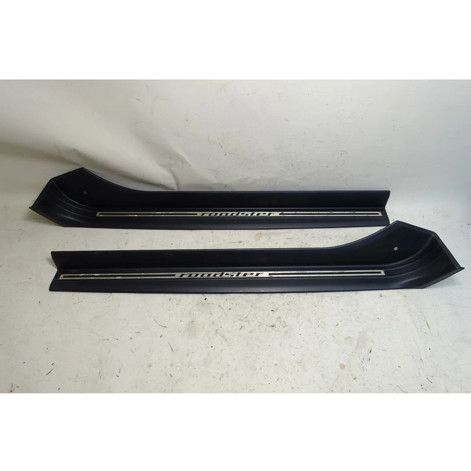 Par de cubiertas de entrada de umbral de puerta izquierda derecha negra BMW Z3 Roadster 1996-2002 OEM Foto 1 de 4
