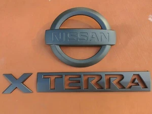NISSAN X TERRA BLACK 2005-2012 EMBLEM WITH LOGO OEM Used - Picture 1 of 5
