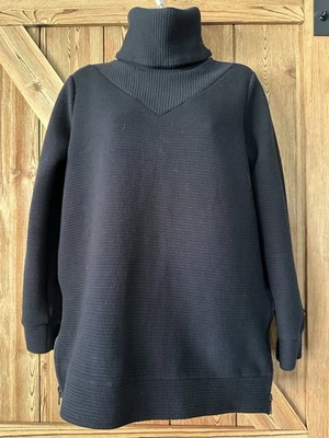 Pullover negro mediano LOLE acanalado cuello alto cremalleras laterales talla pequeña Foto 1 de 4