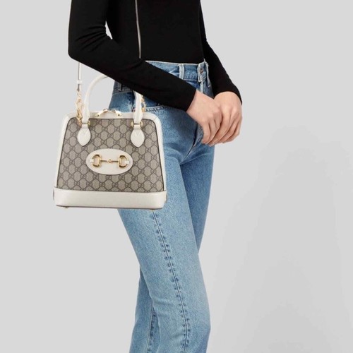 Piccola borsa con manico superiore GUCCI GG Supreme rivestita in tela cavallo 1955 bianca
