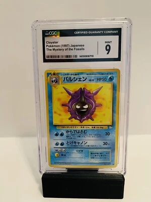 CGC 9 Mint Cloyster Pokemon (1997) Japanese The Mystery Of The Fossils  - Image 1 of 2