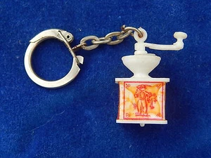 PORTE-CLES / Key ring - MOULIN A CAFE / Coffee grinder - CIGOGNE - SYMPA / Nice - Imagen 1 de 2