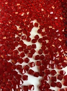 Cuentas bicónicas elementos de cristal de Swarovski - 6 mm de siam claro - Imagen 1 de 6