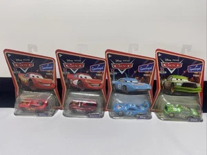 Pixar Cars Lot Supercharged Diecast 1:55 2 McQueen Dinoco - King - Chick - Bild 1 von 7