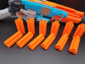 12x Carcasas para Sledgefire ShotGun Blaster Triple Naranja Dardo Pistola Trineo Fuego Juguete - Imagen 1 de 3
