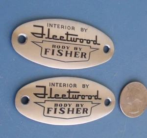 CADILLAC BODY BY FISHER INTERIOR FLEETWOOD SEAT FRAME?SILL EMBLEMS PAIR 50s 58? - Picture 1 of 5