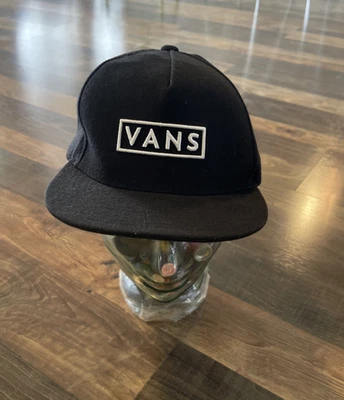 Gorra de béisbol Vans Off the Wall ajustable con cierre a presión negra con logotipo blanco  Foto 1 de 4