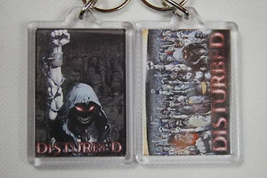 DISTURBED TEN THOUSAND FISTS PLASTIC KEYCHAIN KEYRING NEW OFFICIAL ASYLUM - Picture 1 of 1