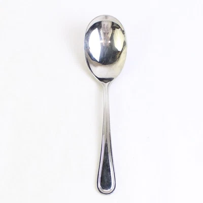 Update International Regency Solid Casserole Serving Spoon, 8 7/8" Stainless - Image 1 of 4