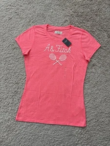 T-shirt Abercrombie Fitch Y2K anni 2000 donna SS racchette tennis grafica nuova con etichette taglia L - Foto 1 di 8