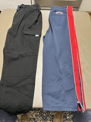 2 pares de pantalones de chándal Tommy Hilfiger para niños usados talla lge negros cargo y deportivos Foto 1 de 4