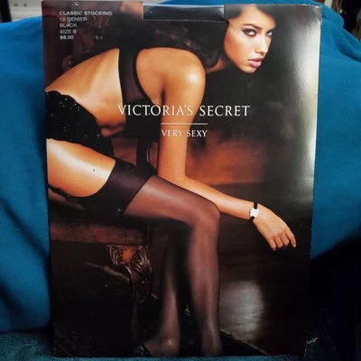 Medias clásicas muy sexy de Victoria’s Secret 15 denier negras - talla B hasta el muslo Foto 1 de 4