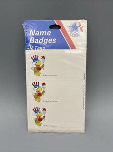 1 PACK 1980 USA Olympics 18 Name Badges Self Adhesive Tags NEW SEALED - Picture 1 of 3
