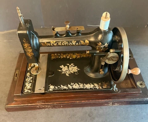 ANTIQUE NEW HOME-NEW NATIONAL - HAND CRANK SEWING MACHINE Cover