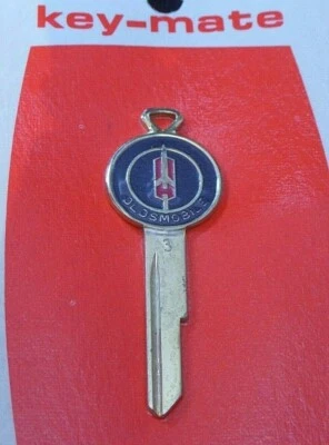 OLDSMOBILE Golden Rocket Crest KEY BLANK 1968 1972 1976 1980 87-89 Cutlass 442  - Image 1 of 4