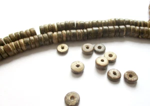 1 Strang Kokosperlen 8 mm x 3 mm braun 100 Perlen - Bild 1 von 1