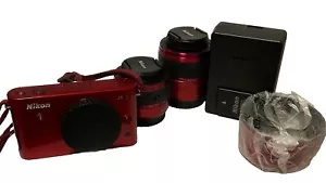 Nikon 1 J1 10.1 MP HD Digital Camera System with 10-30mm VR and 30-110mm VR 1... - Picture 1 of 13