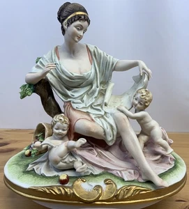 J. Laurent Signed Porcelain Figurine Woman with Cherubs Capodimonte Style - Picture 1 of 9