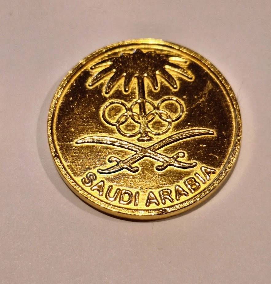 Olimpiadas de Atenas 2004 - Arabia Saudita pin noc  Foto 1 de 1