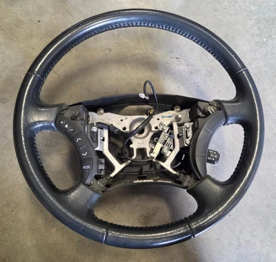 Volante OEM NEGRO CON CONTROLES DE RADIO 2003-2009 TOYOTA 4RUNNER Foto 1 de 4