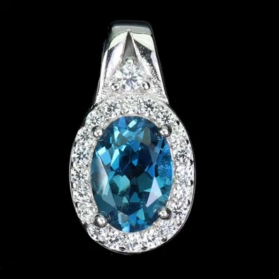 Colgante de plata de ley 925 ovalado topacio azul Londres 7x5 mm joyas de piedras preciosas Foto 1 de 4