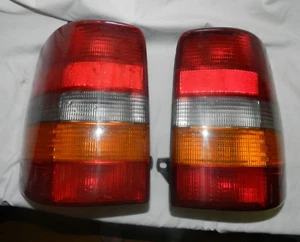 Set OEM 1993-98 Jeep Grand Cherokee  RH Rear LH Tail Lights 55054512 & 513 - Picture 1 of 10