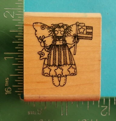 Estampación de ÁNGEL SOSTENIENDO UNA BANDERA Sello de Goma Estrellas Patrióticas Rayas Foto 1 de 2