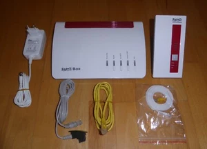 AVM FRITZ!BOX 7590 DSL-Router 2000 2828 + Fritz 1750E Repeater,Vollfunktionsfäh. - Bild 1 von 8