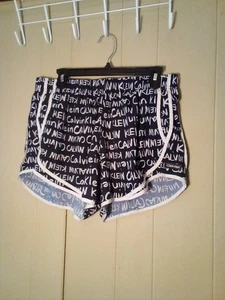 Calvin Klein pantaloncino donna L atletico corsa attiva fodera spell out nero bianco - Foto 1 di 14