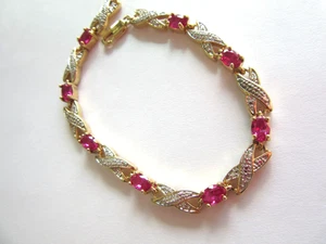 PAJ gold tone X and O lab created ruby bracelet - Picture 1 of 4