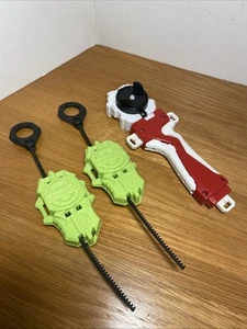 Beyblade Burst Quad Strike Launcher Ripcord X2 Burst Launcher mit Griff - Bild 1 von 9