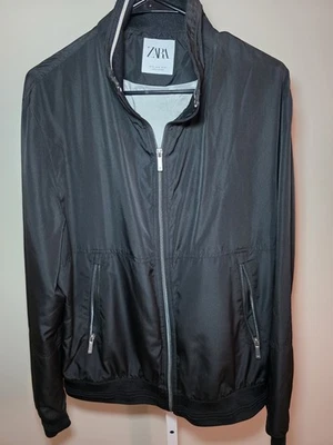 Chaqueta deportiva Zara para hombre con cremallera completa y bolsillos con cremallera negra talla XL Foto 1 de 4