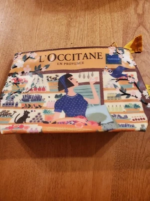 Bolsa de cosméticos L'Occitane naranja y azul Foto 1 de 4
