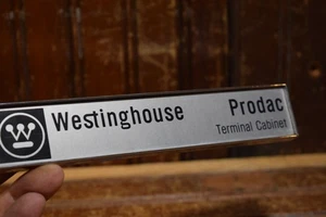 WESTINGHOUSE PRODAC TERMINAL CABINET METAL EMBLEM BADGE MARKER SIGN 7" x 1-3/8" - Picture 1 of 11