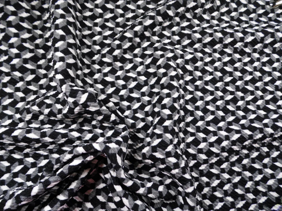 Tela texturizada Liverpool estampada bala elástica gris azteca negro blanco V25 Foto 1 de 1