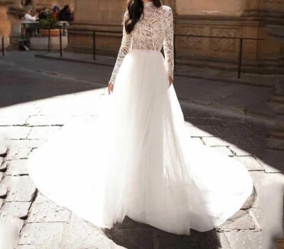 Vestidos de novia musulmanes manga larga cuello alto encaje línea A vestidos de novia tren Foto 1 de 4