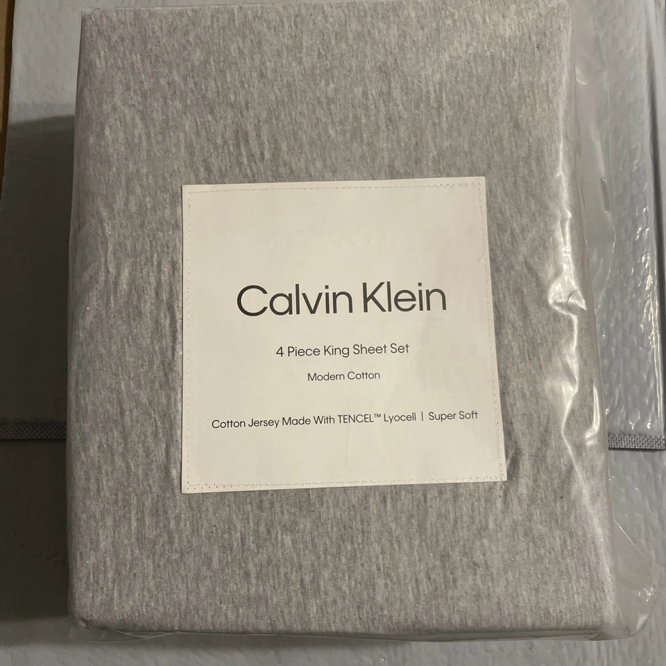 Juego de sábanas Calvin Klein 4 piezas King moderno algodón malange jersey gris/azul  Foto 1 de 4